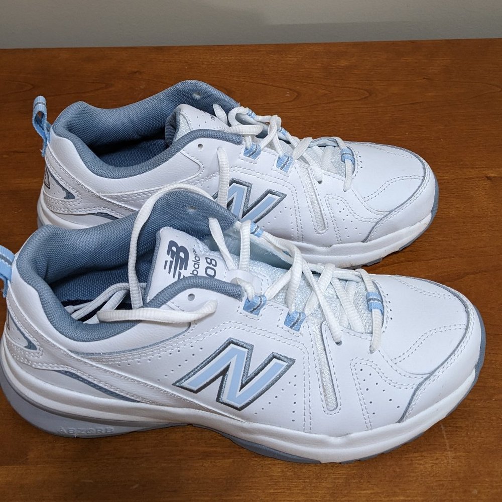 White leather (blue accents) New Balance walk/run shoes